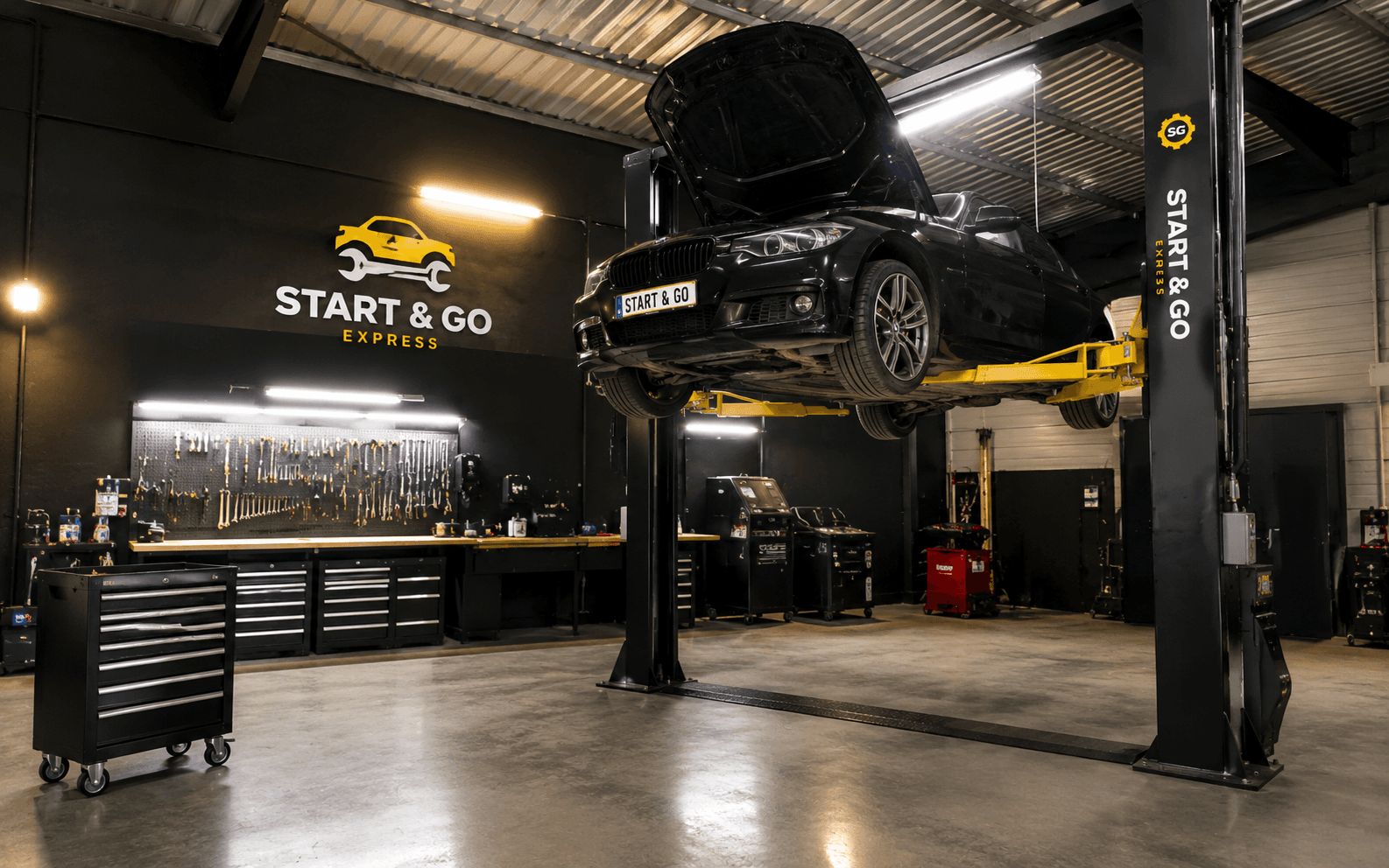 Atelier Start & Go Express — révision voiture sur pont élévateur